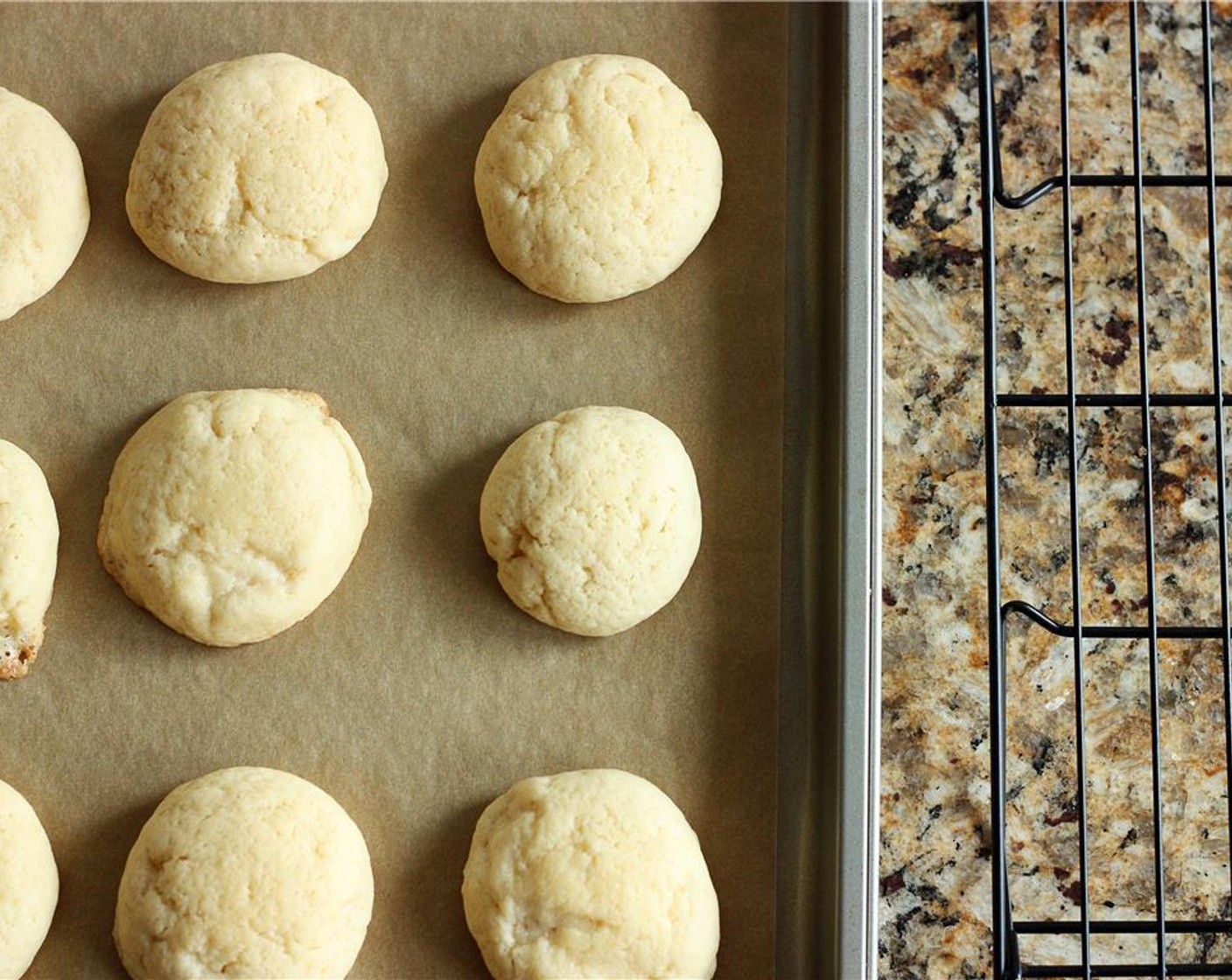 step 8 Remove pan from the oven and allow the cookies to rest for 3-5 minutes. Lift cookies onto a cooling rack and allow to cool completely before frosting.