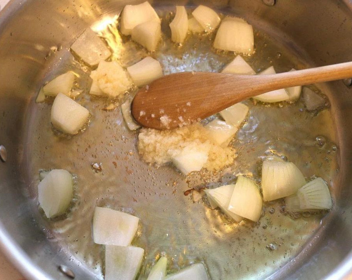step 1 Sauteé Onion (1) with Garlic Paste (1 Tbsp) in Olive Oil (1 cup).