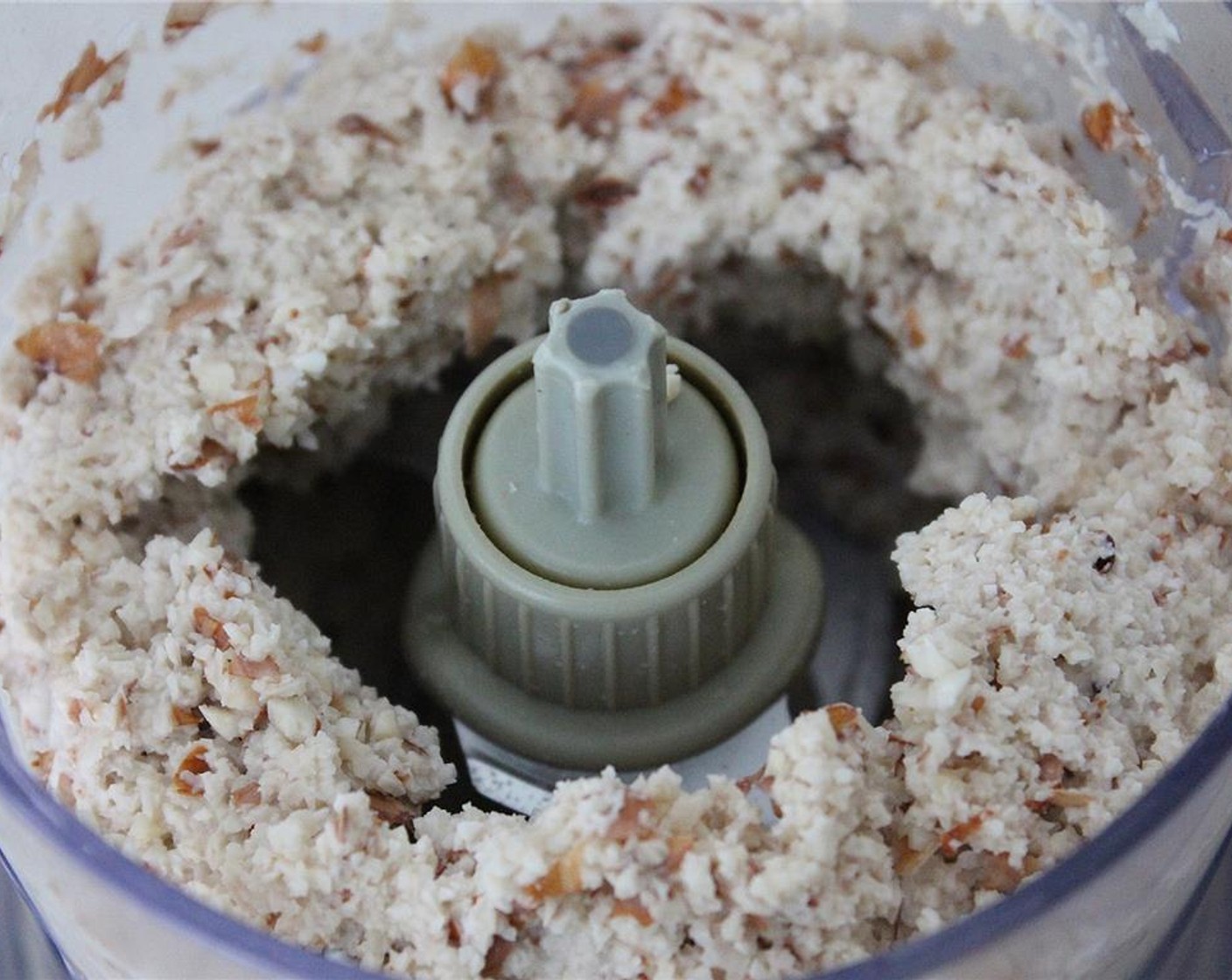 step 2 Add the almonds to a food processor or kitchen ninja. Blend until the almonds are more like a mush.