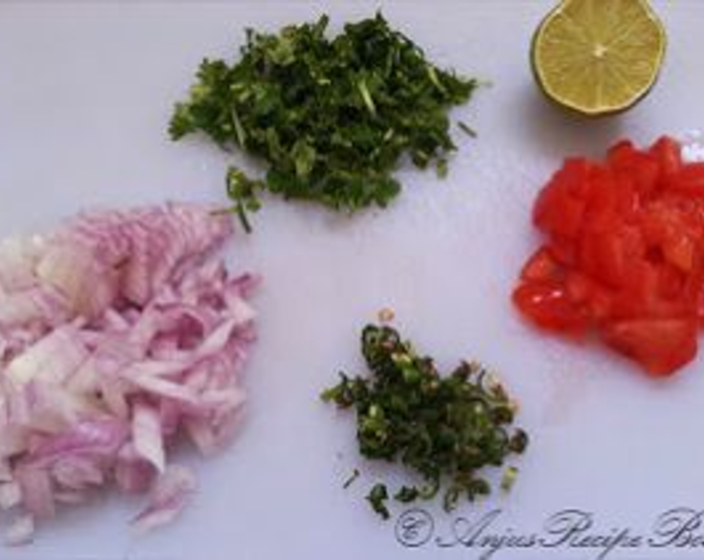 step 2 Chop Onion (1), Green Chili Peppers (2), Tomato (1), and Fresh Cilantro (1 Tbsp).