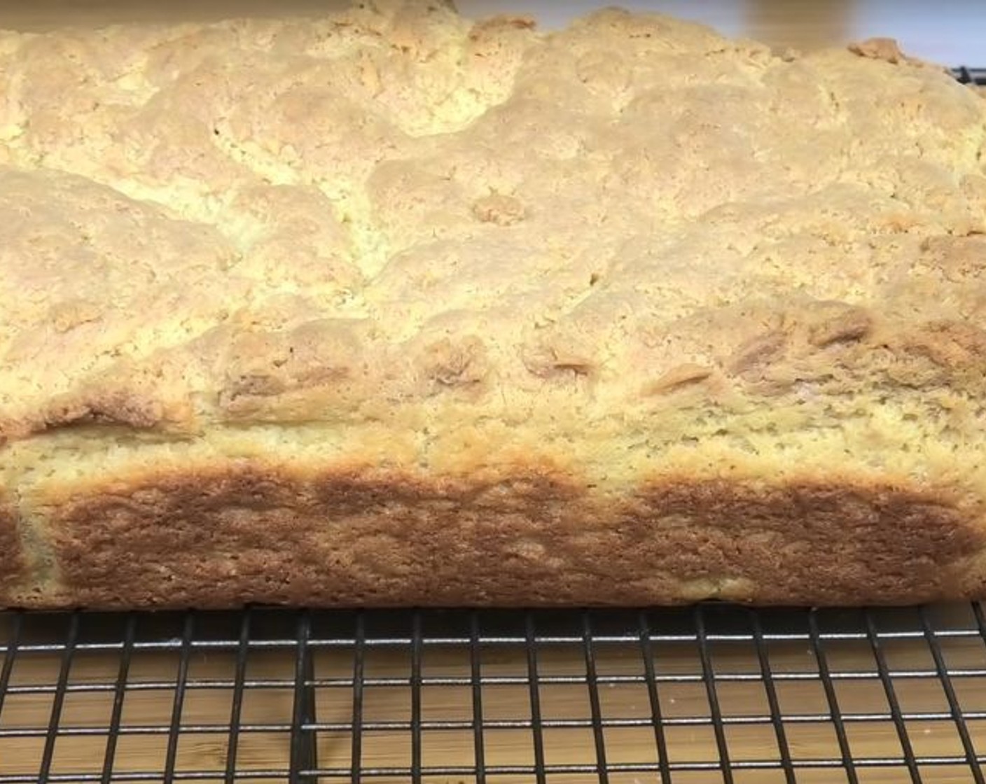 step 7 Once done, carefully take it out of the baking tray and place it on a wire rack. Let it cool completely for 60 minutes.