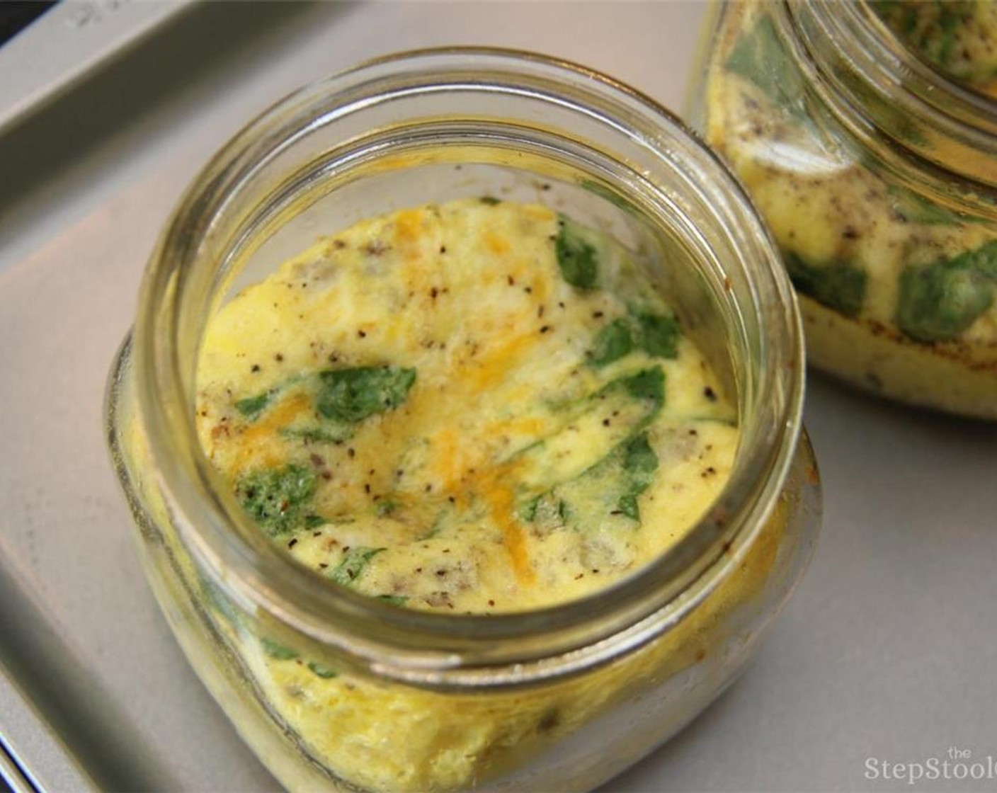 step 4 Place jars on a cookie sheet and bake for 15-20 minutes or until firm.