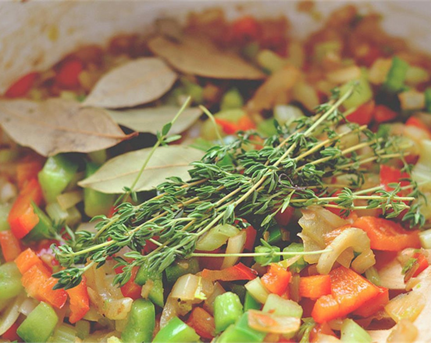 step 5 Add Celery (150 g), Green Bell Pepper (1), and Red Bell Pepper (1) to the same pot and saute for 5-8 minutes longer.