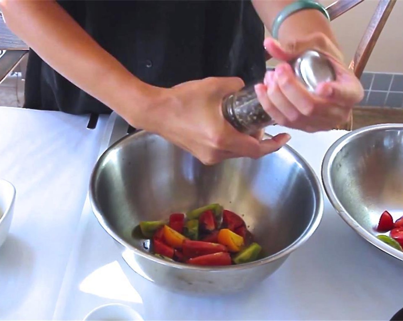 step 1 Chop the Bitter Melon Leaves (1 Tbsp). Cut the Heirloom Tomatoes (3) into wedges. In a large bowl, combine heirloom tomatoes with desired amount of Red Wine Vinaigrette (to taste), Salt (to taste), Ground Black Pepper (to taste), and Fresh Purple Basil (to taste).