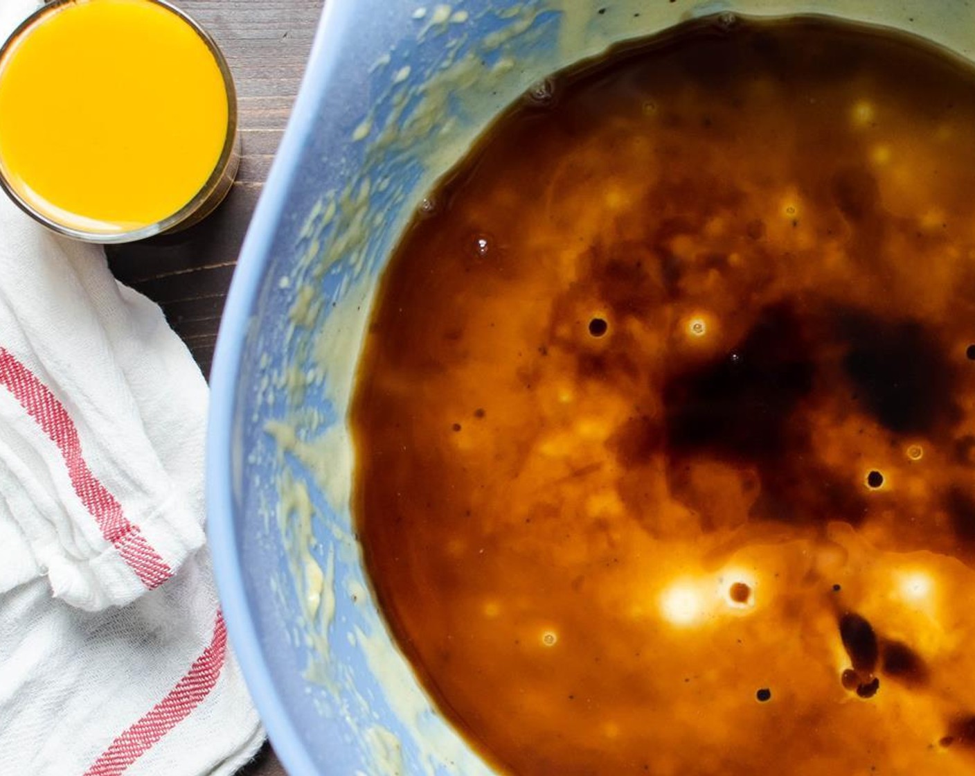 step 8 Add browned butter to the mixture beat on medium speed. Add Rum (4 Tbsp) and Passion Fruit Nectar (1/3 cup) and beat for 1 minute.