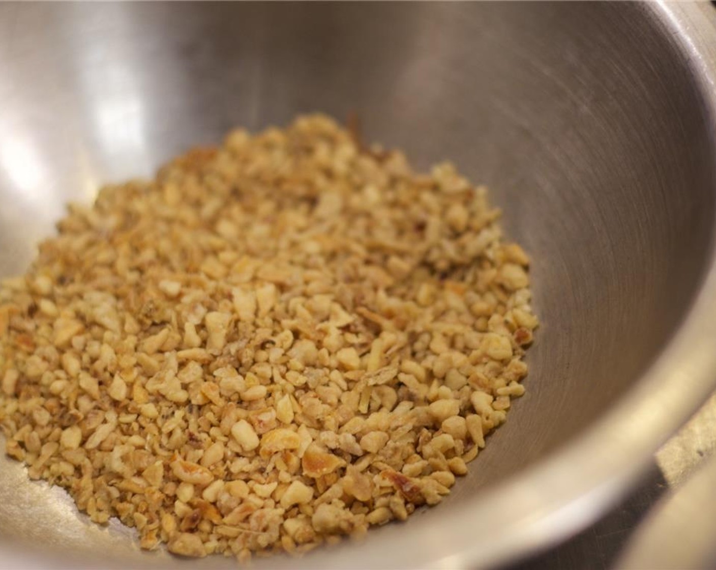 step 2 Prepare the Garlic (3 cloves) and fry until golden in the same oil. Remove and place the toasted garlic on a paper towel-lined plate.