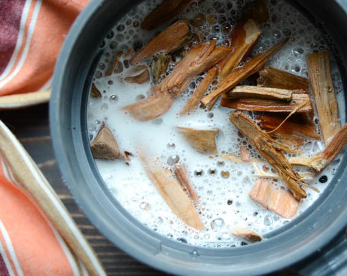 step 2 Soak the cherry wood chips for an hour in a container with half of the Beer (1 can) and a cup of water.