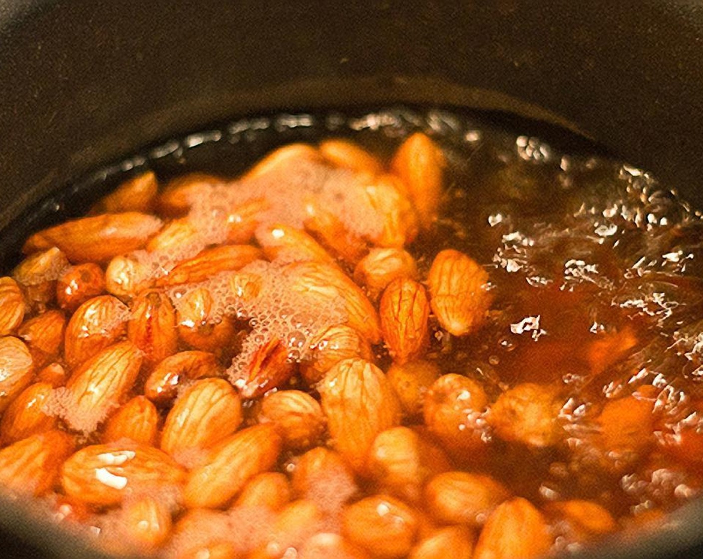 step 2 Boil a pot of Water (4 cups), Almonds (1 cup) in the boiling water and cook for 1-2 minutes then drain.