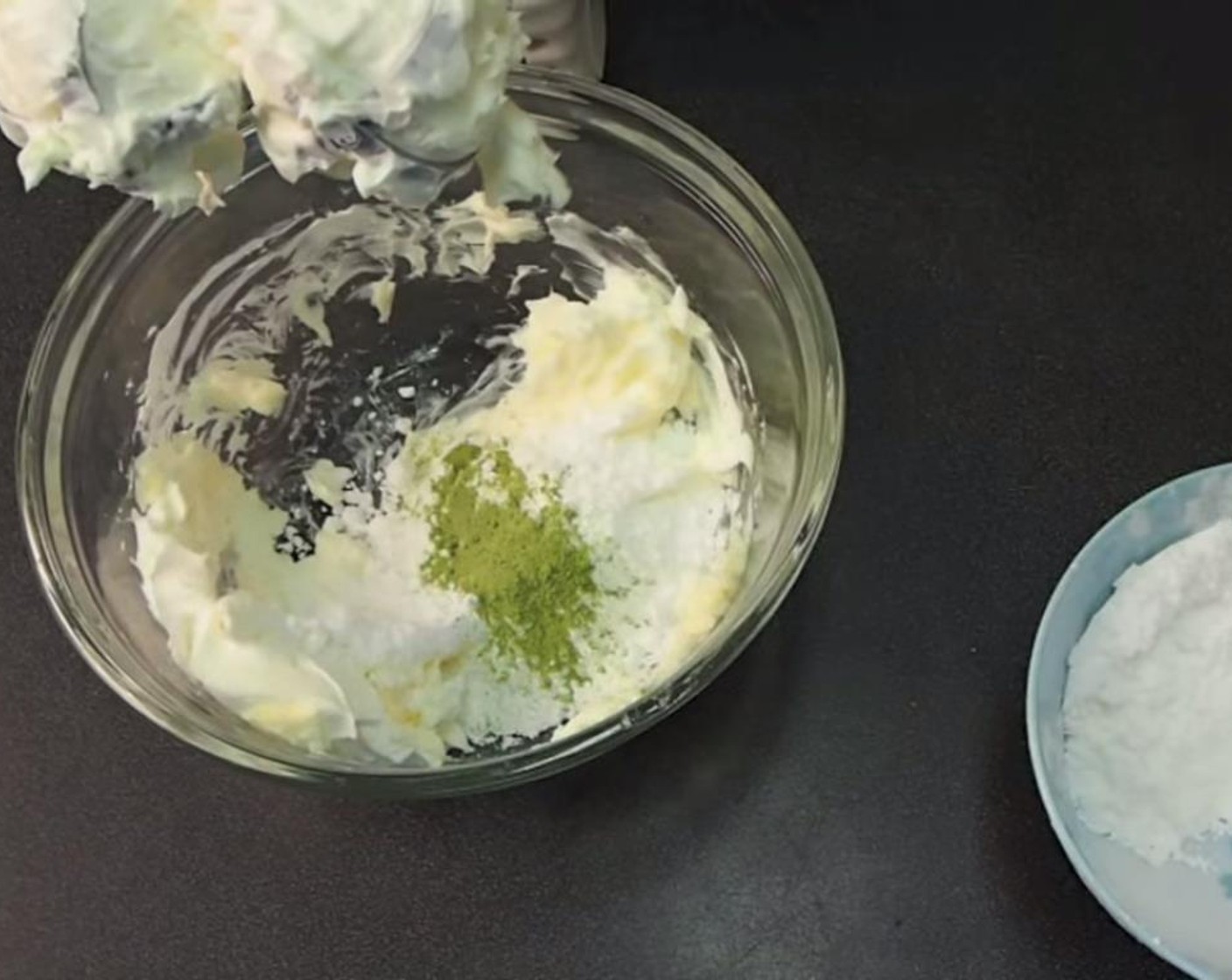 step 10 To create the filling, cream Matcha Powder (1 Tbsp), room temperature Cream Cheese (1/2 cup), Vanilla Extract (1 tsp), and sifted Powdered Confectioners Sugar (1/2 cup) together.  Fill a piping bag with the cream filling.