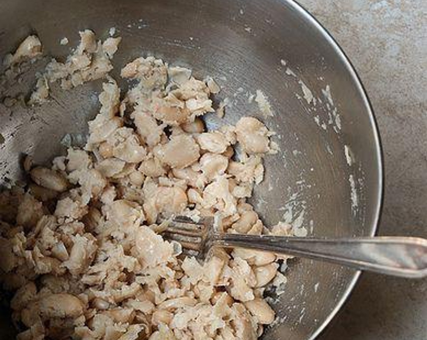 step 5 Next, mash your Canned Cannellini White Kidney Beans (2 cups). I mashed about 3/4 of the beans leaving a quarter of the batch whole or somewhat whole.