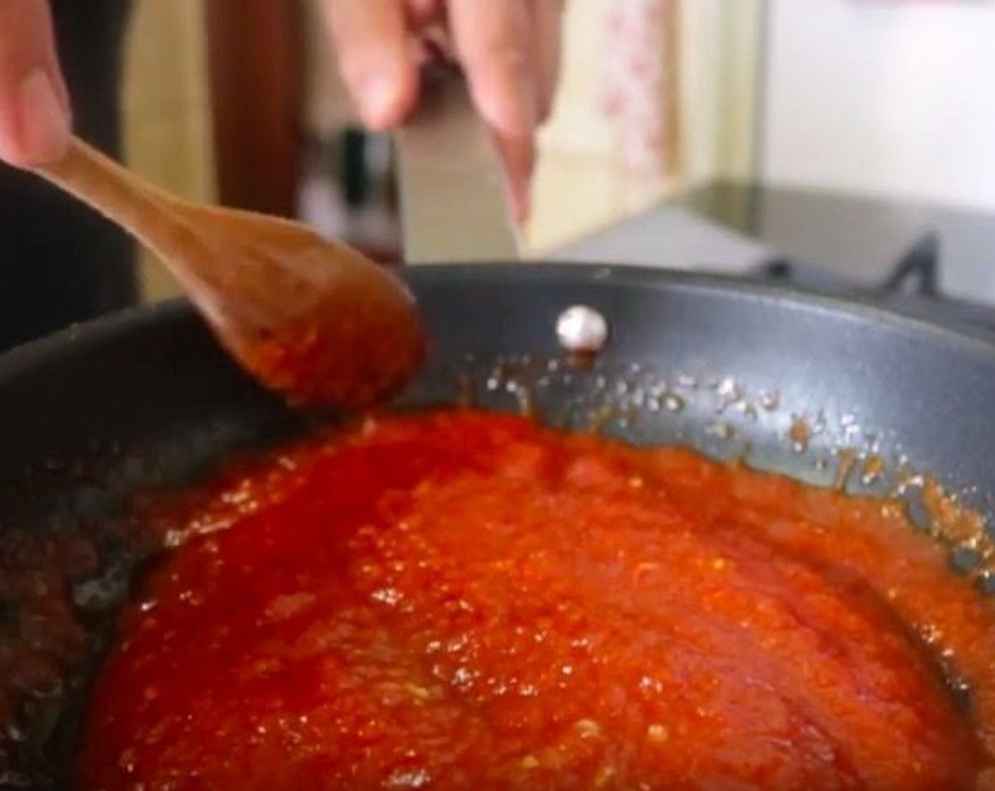 step 11 Add Canned Tomato Purée (1/2 cup) and season with Sea Salt (to taste), Ground Black Pepper (to taste), and Granulated Sugar (to taste). Decrease the temperature to a low heat and let it simmer until the potatoes are cooked.