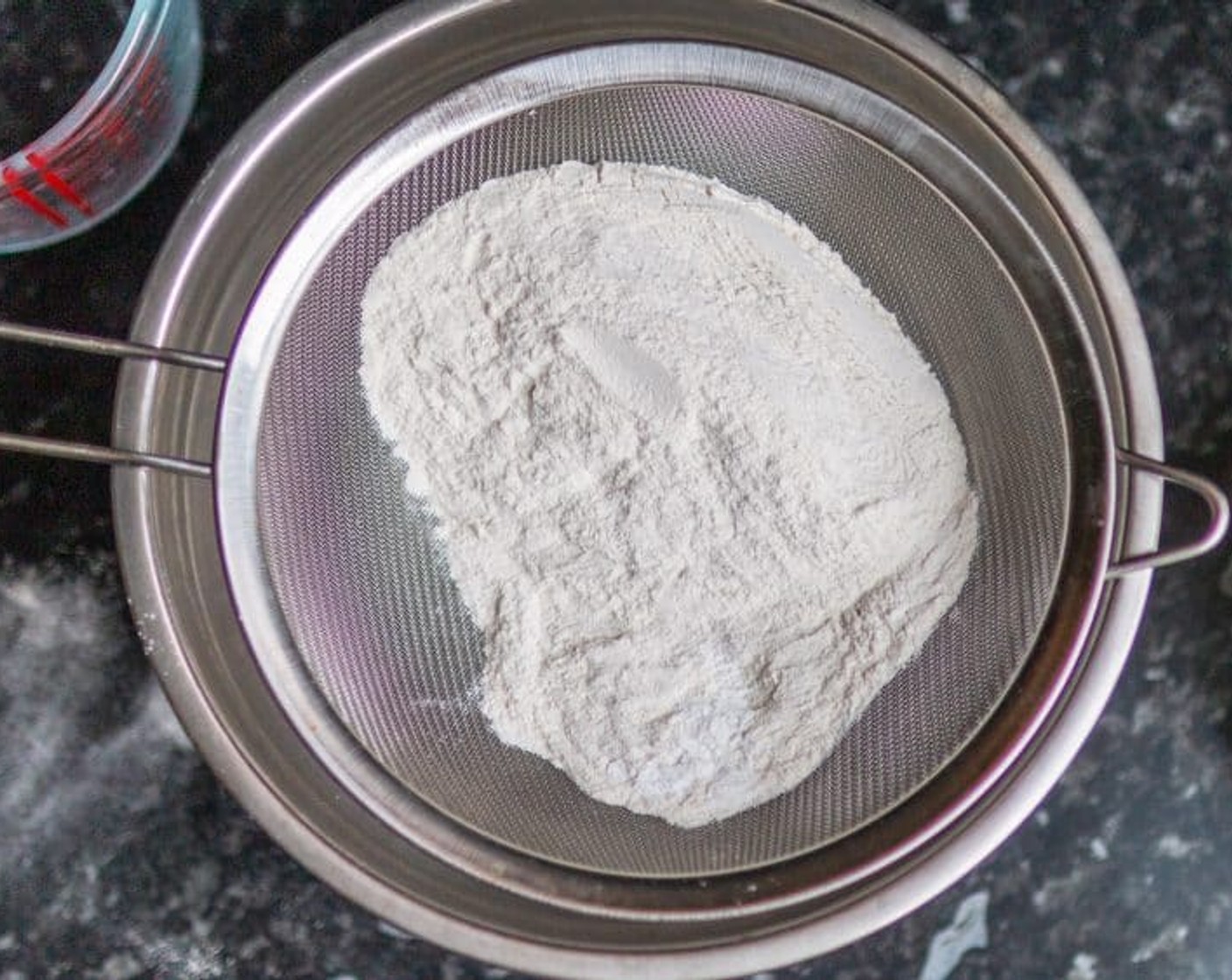 step 2 Sift All-Purpose Flour (1 3/4 cups), Baking Powder (1 Tbsp), and Salt (1 pinch) into a large mixing bowl.