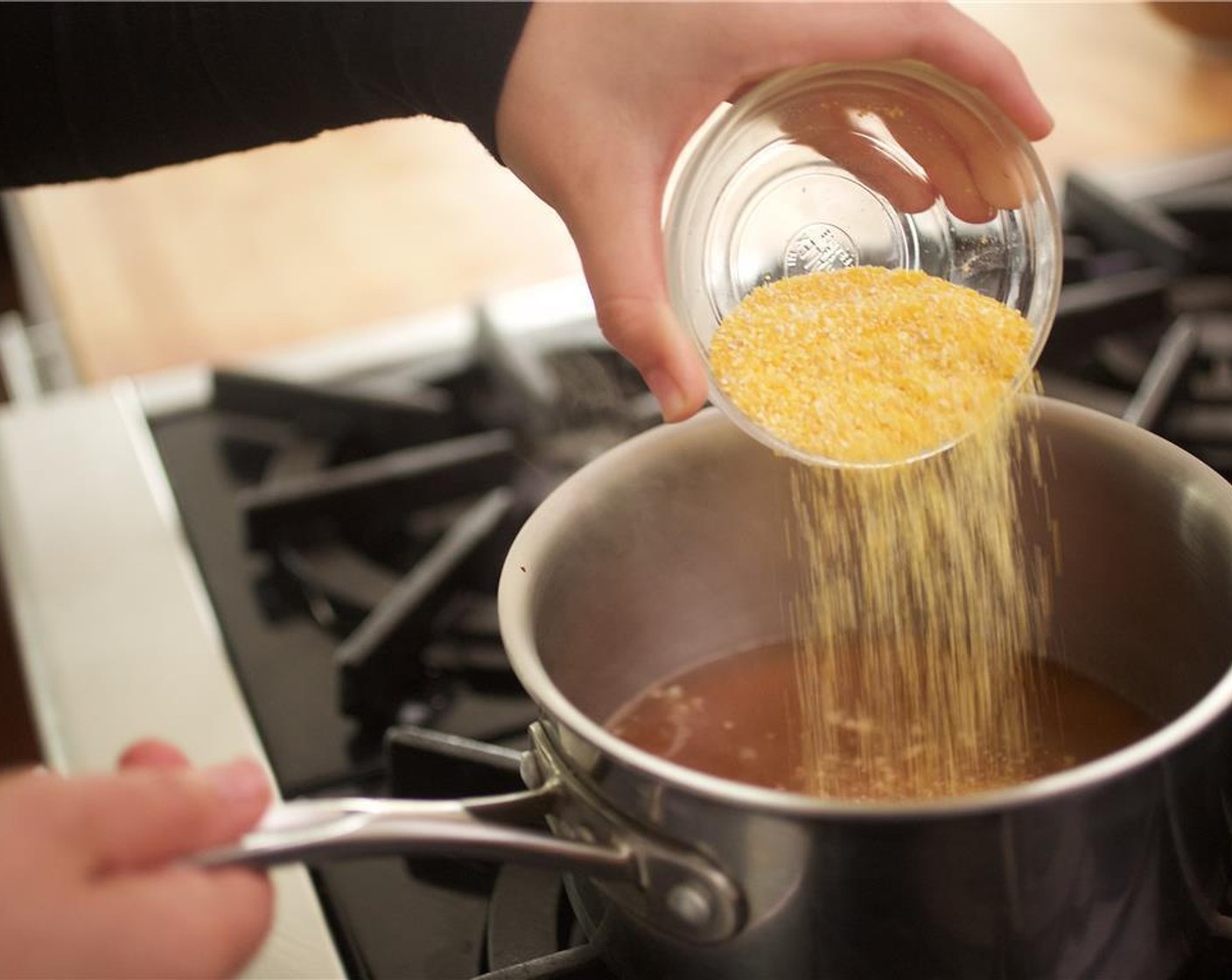 step 5 Add Polenta Grits (1/3 cup), Salt (1/2 tsp), and reduce the heat to low and cover, stirring occasionally. Cook grits for 20 minutes, then remove from heat.