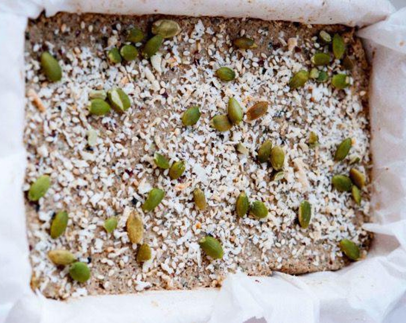 step 4 Sprinkle with extra sesame seeds, coconut, and pumpkin ​seeds