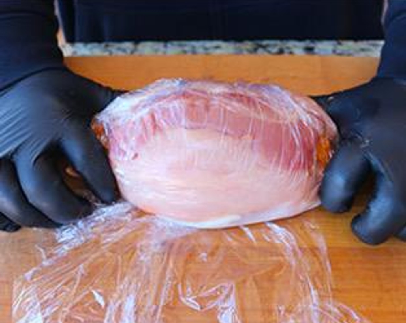 step 5 Fold the edges of the turkey breast around and cover tightly with plastic wrap. Store in refrigerator for 2 hours up to overnight.