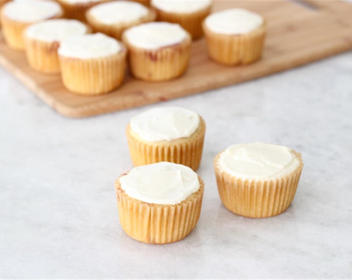 step 9 When the cupcakes are completely cool, use a small offset spatula or a butter knife to frost the top of the cupcakes.