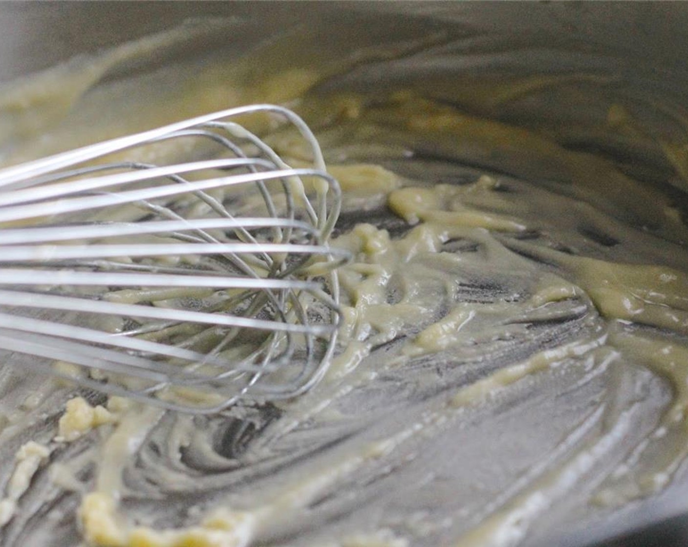 step 13 Now prepare the Mornay Sauce by melting the Butter (3 Tbsp) and whisking in the All-Purpose Flour (2 Tbsp).