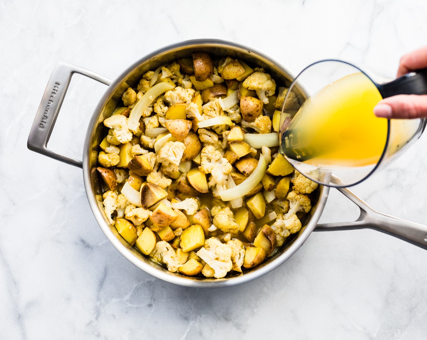 step 5 Add roasted vegetables and Chicken Broth (2 cups) to the saucepan and bring everything to a boil. Cover and cook on medium-high heat for 5-10 minutes, or until potato and cauliflower are very soft.