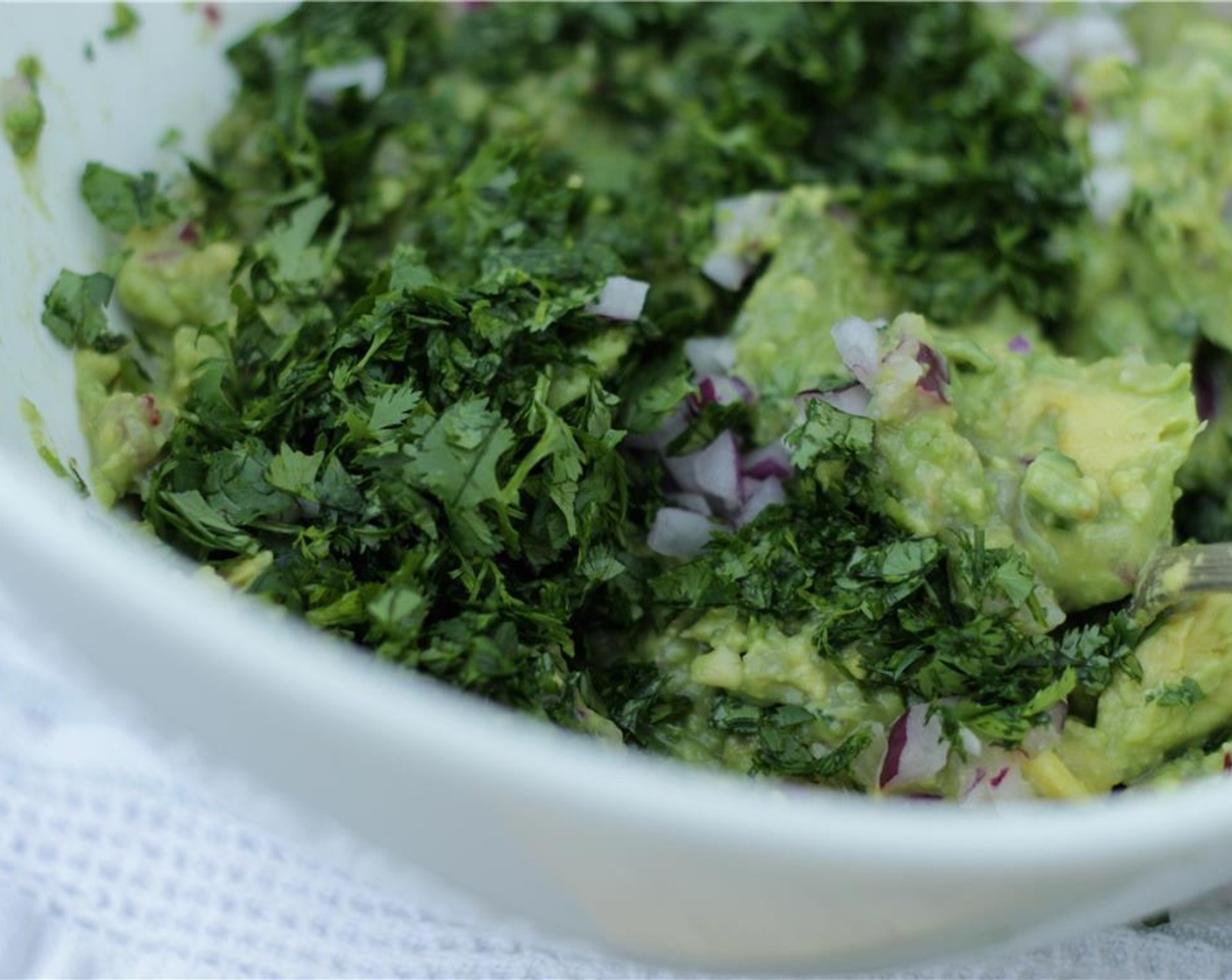 step 8 Fold in the chopped cilantro. Season with Salt (to taste) and Ground Black Pepper (to taste). Serve immediately or cover tightly with plastic wrap and store in the refrigerator.