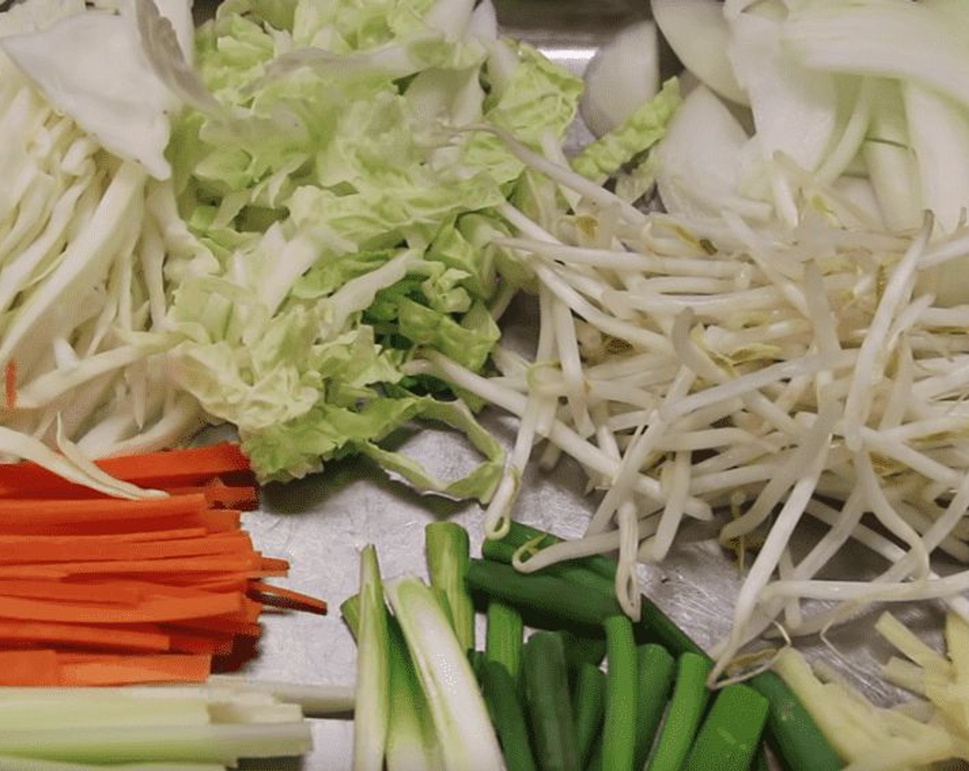 step 10 In addition to the other vegetables, get the Bean Sprouts (1/4 cup) and Bamboo Shoot Strips (1 1/2 Tbsp) ready.