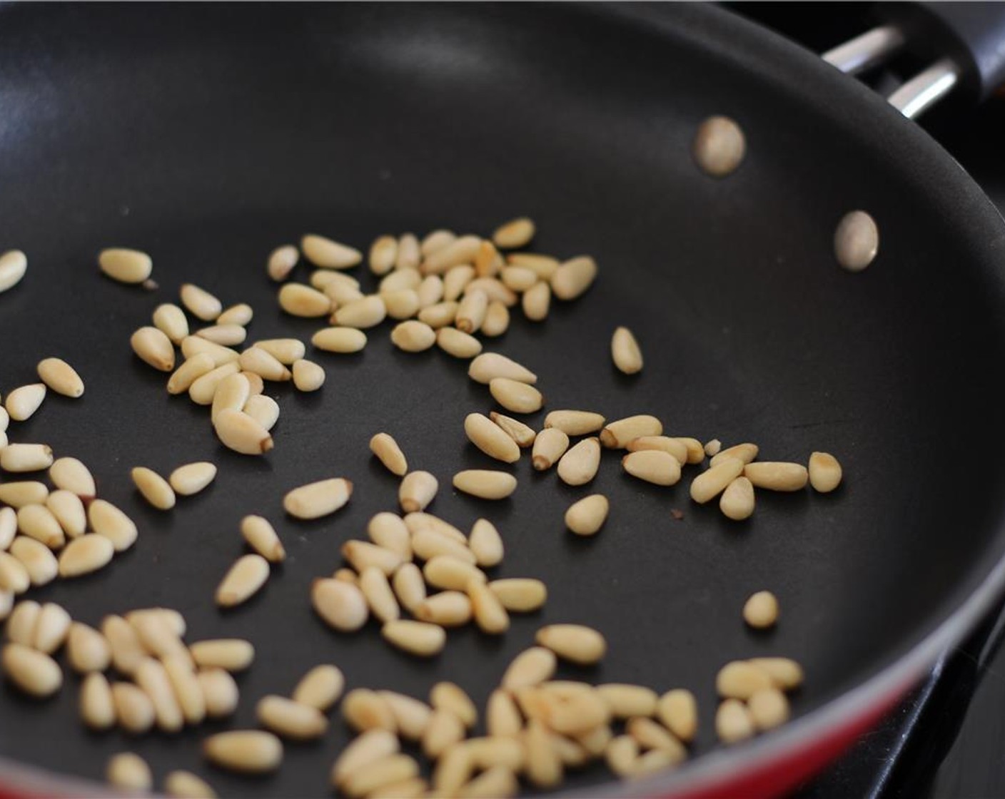 step 5 Toast the Pine Nuts (1/4 cup) in a skillet over medium heat.
