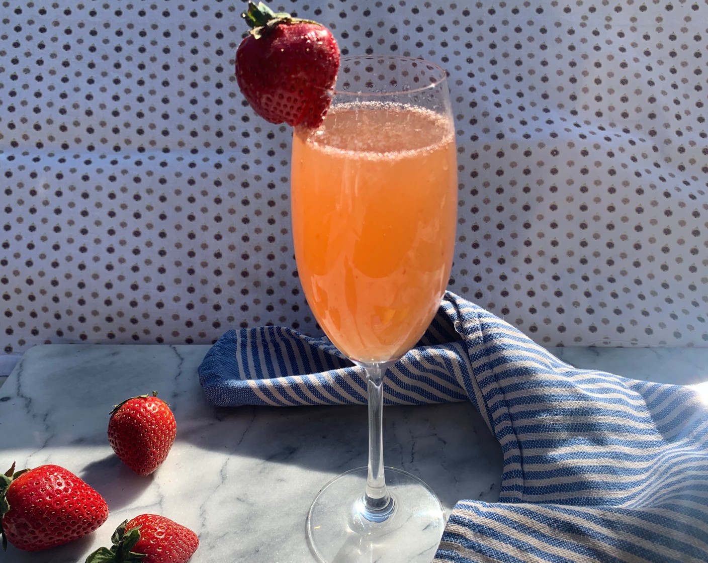 step 3 Strain into a chilled champagne flute and top with Dry Sparkling Wine (to taste). Garnish with Lemon Peel (to taste).
