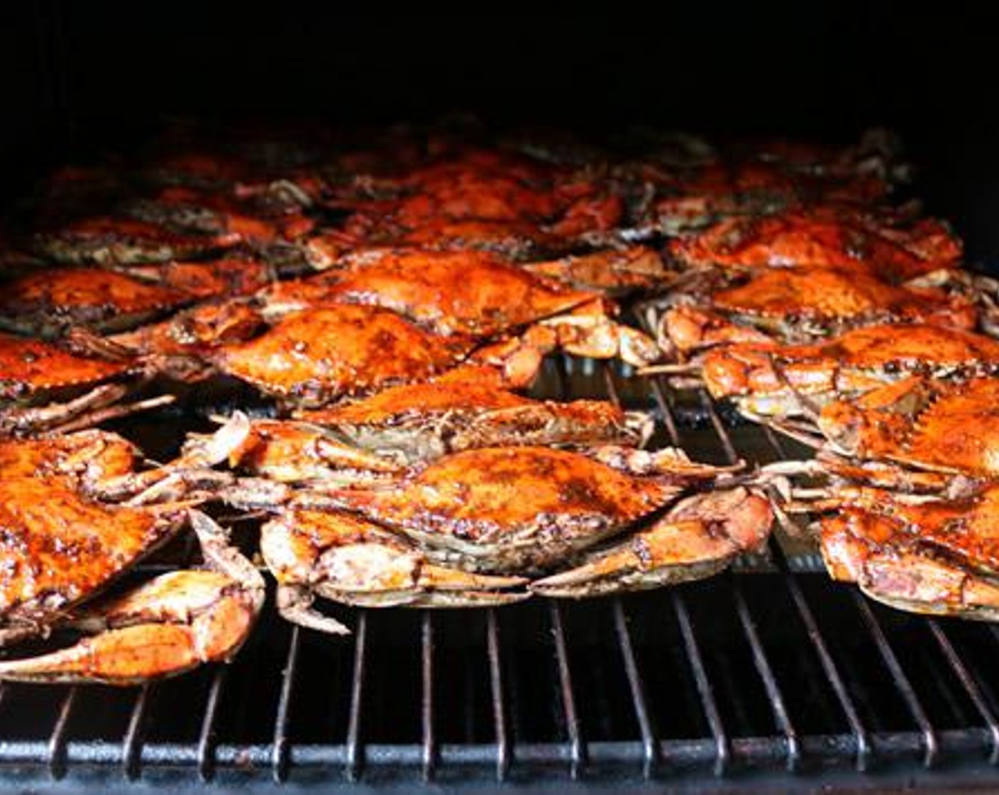 step 4 Arrange Steamed Blue Crabs (24) on cooking grate and smoke for 15 Minutes.