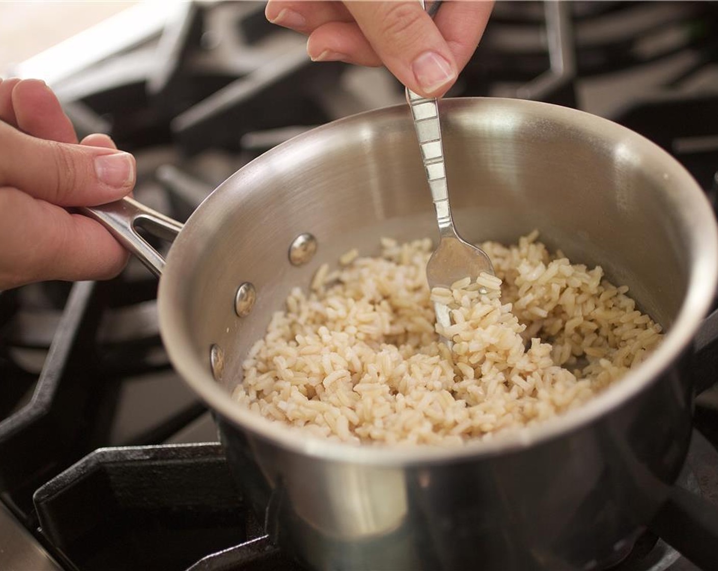 step 3 Remove from heat and fluff rice with a fork. Cover and keep warm.