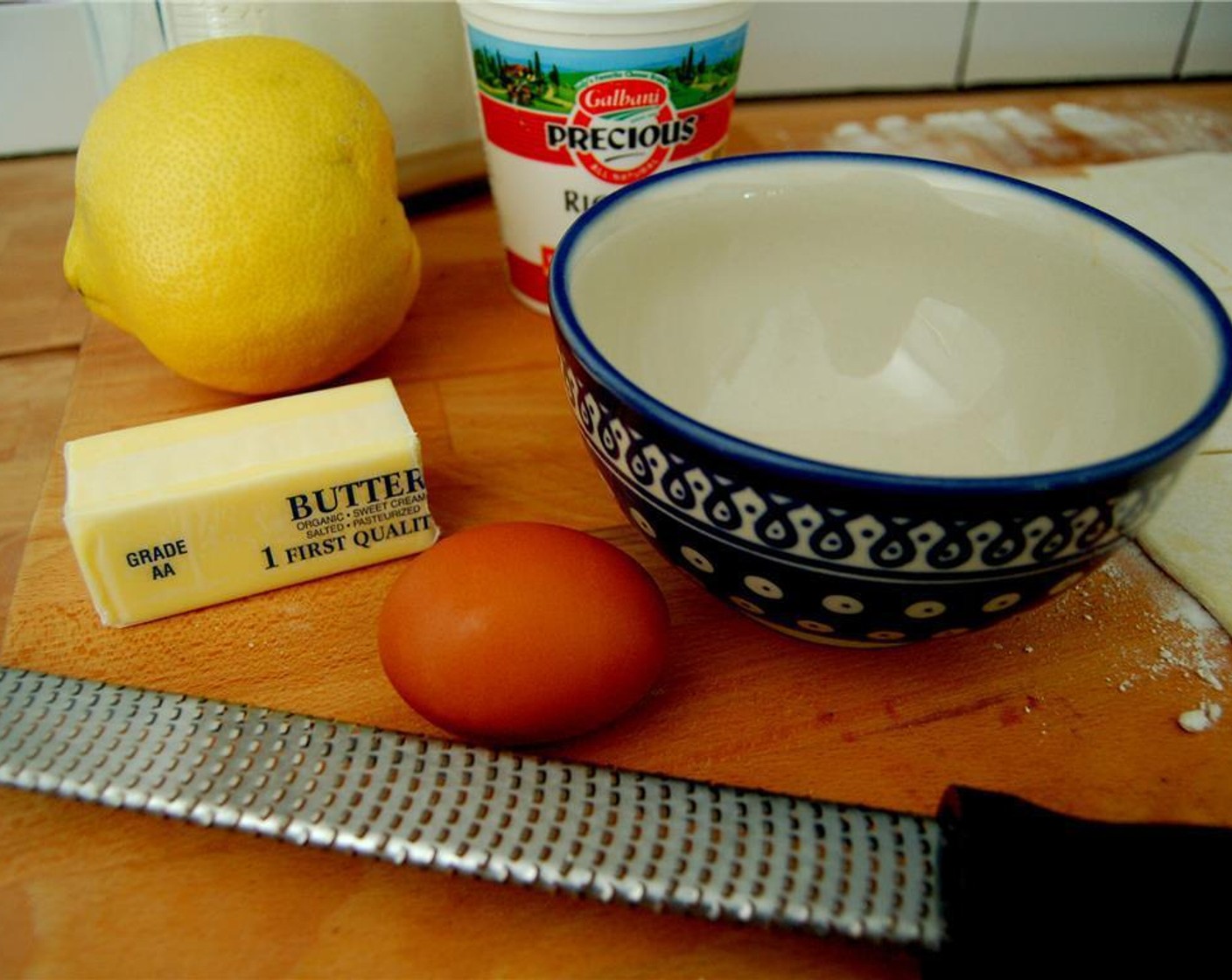 step 2 Mix together the Ricotta Cheese (1 cup), Granulated Sugar (1/3 cup), zest from Lemon (1) and Salt (1 pinch).