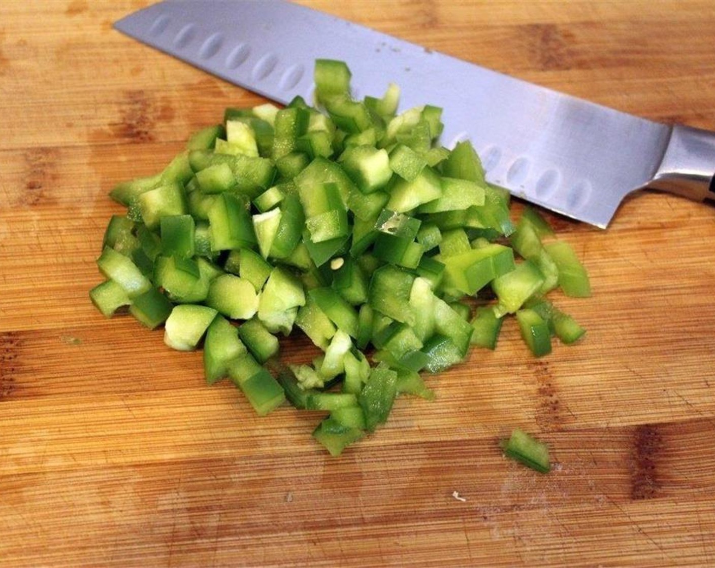 step 2 Finely chop the Green Bell Pepper (1/2).