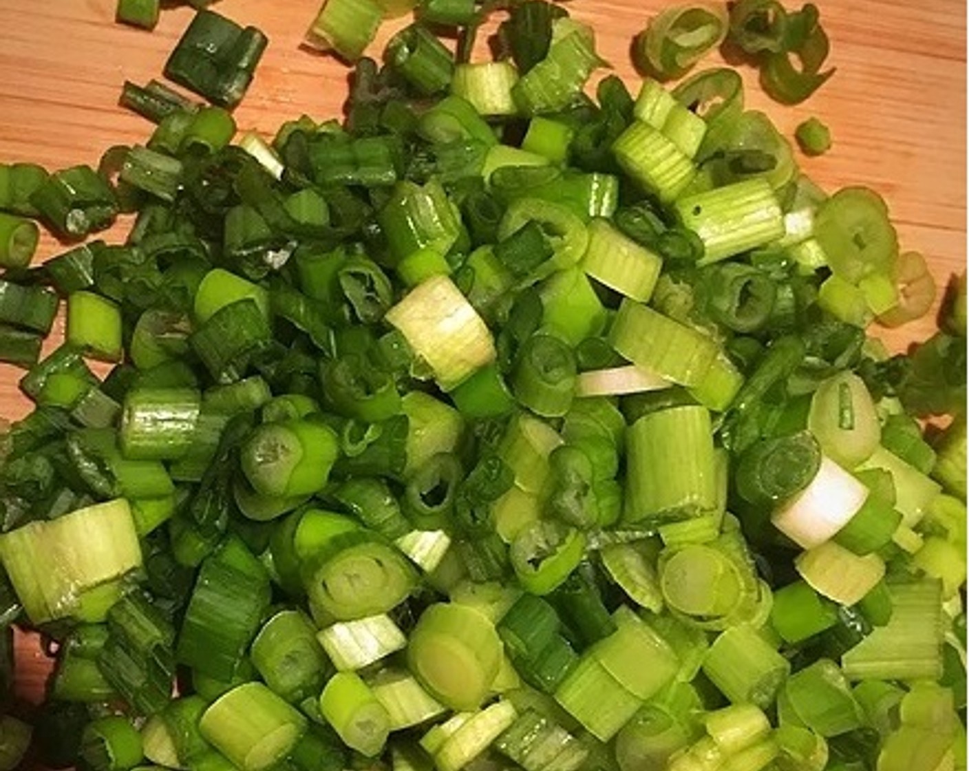 step 10 Thinly slice the Scallion (1 bunch) into rounds and pick the Fresh Cilantro (1 bunch) off the stems. Combine and set aside.