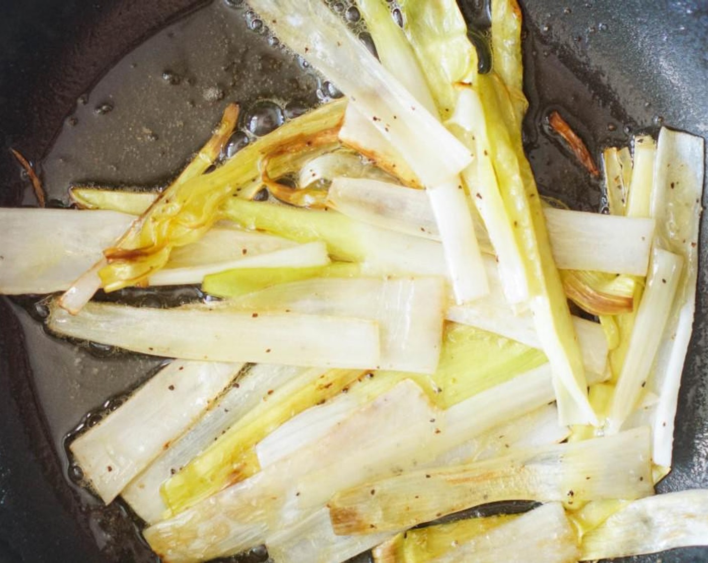 step 5 Heat the Butter (2 Tbsp) and Olive Oil (as needed) in a small sauté pan over medium-high heat. Add the leeks, Salt (to taste), and Ground Black Pepper (to taste).