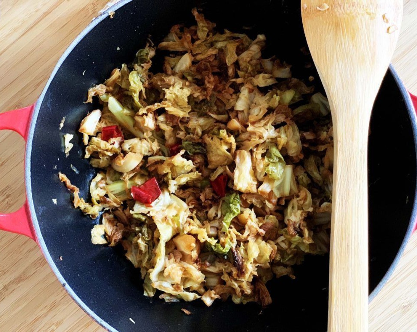 step 3 Add the cabbage and Soy Sauce (2 Tbsp). Stir, then cover with a lid and cook on low heat until cabbage is cooked.