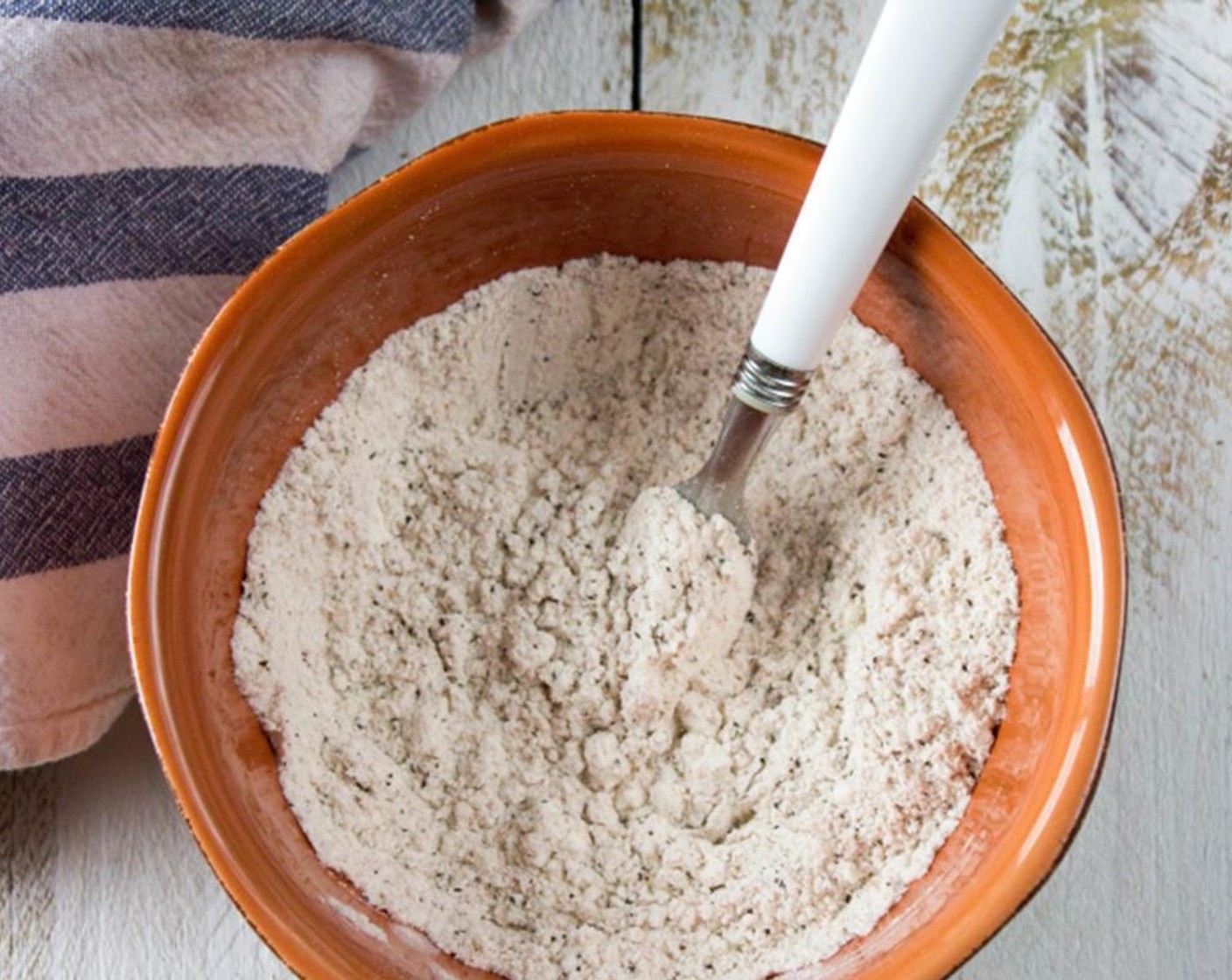 step 3 In separate bowl mix together Gluten-Free All-Purpose Flour (1/2 cup), Ground Black Pepper (1 tsp), Paprika (1 tsp) and Salt (1 tsp).