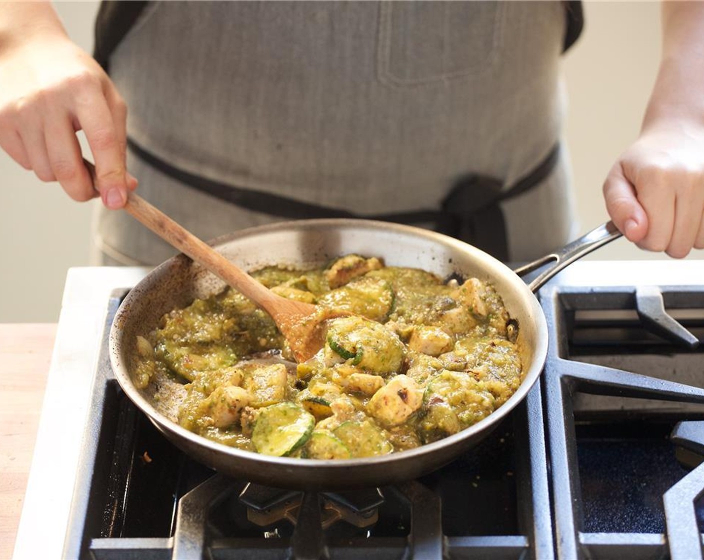 step 20 In a medium saucepan over medium high heat, add Vegetable Oil (1 Tbsp) When hot, add the zucchini.