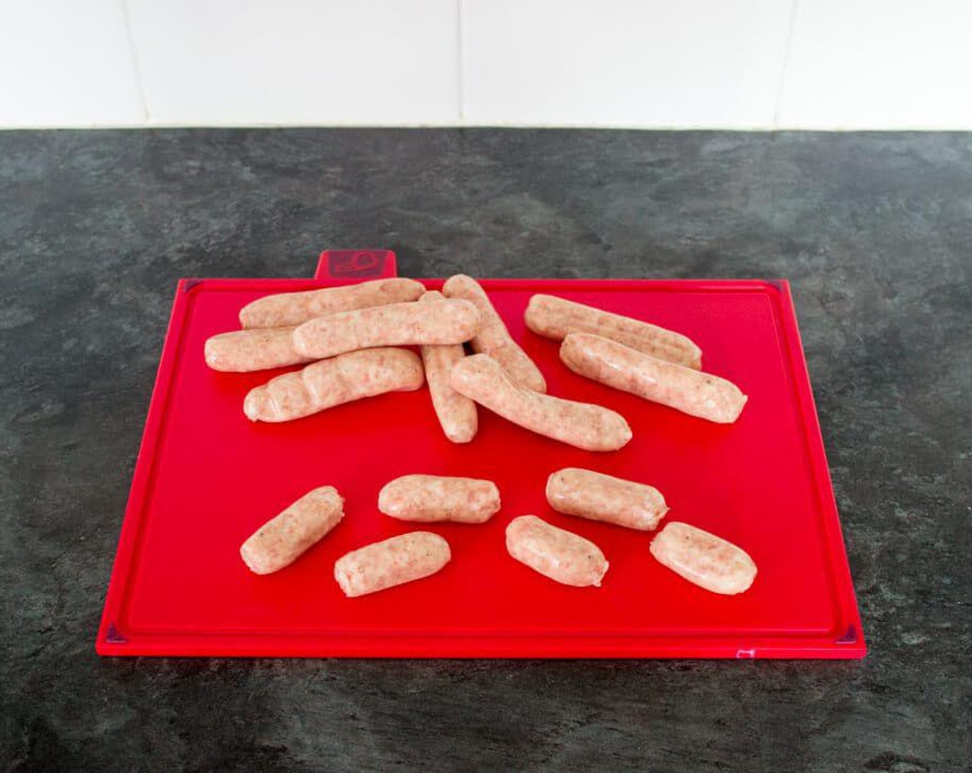 step 2 Next, if you have regular sized Chipolata Sausages (13 oz), twist them in the middle and pull/cut apart to make lots of mini bites. You can already buy them this size from some supermarkets/butchers.