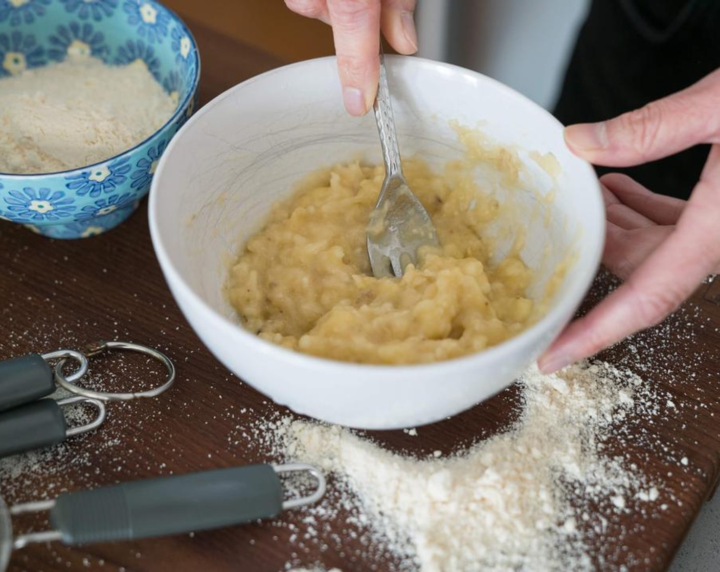 step 2 Combine Zucchini (1 cup), Apple Sauce (1/2 cup), Eggs (2), Banana (1), Dark Pure Maple Syrup (1/2 cup), Vanilla Extract (1 tsp), and Coconut Oil (1/2 cup) in a large bowl.