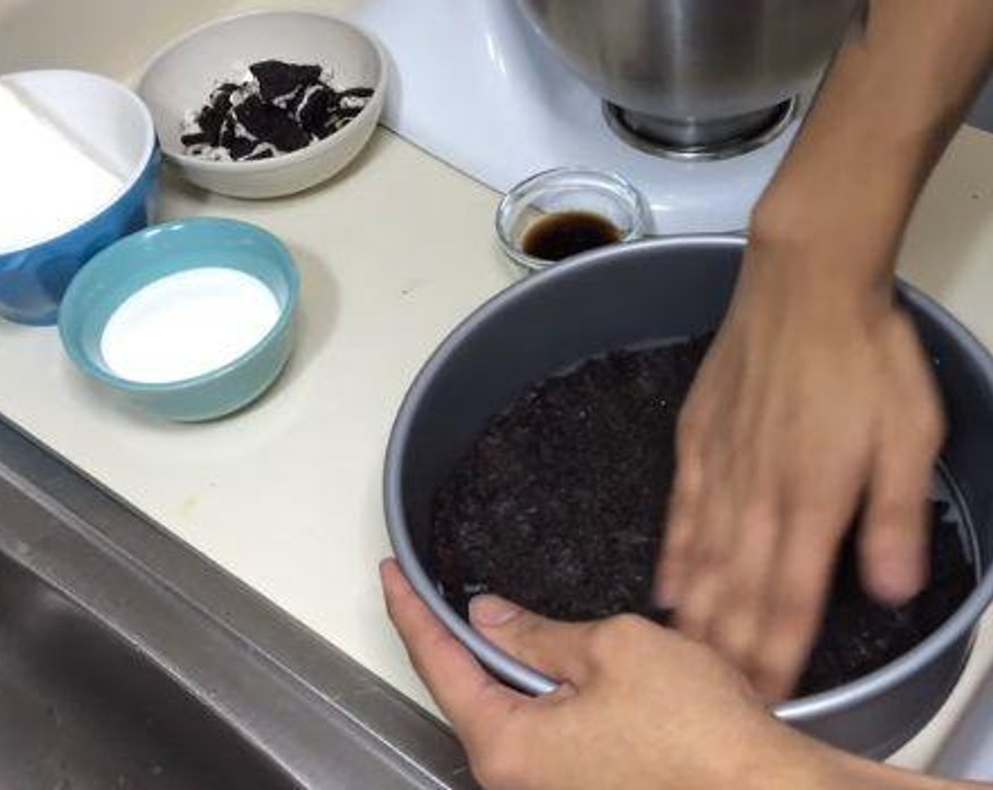 step 1 In a mixing bowl, combine together the Oreo® Chocolate Sandwich Cookies (26) and Butter (1/3 cup). Transfer the mixture into a pan, and press it down with your hands. Chill in the fridge until it is nice and firm.