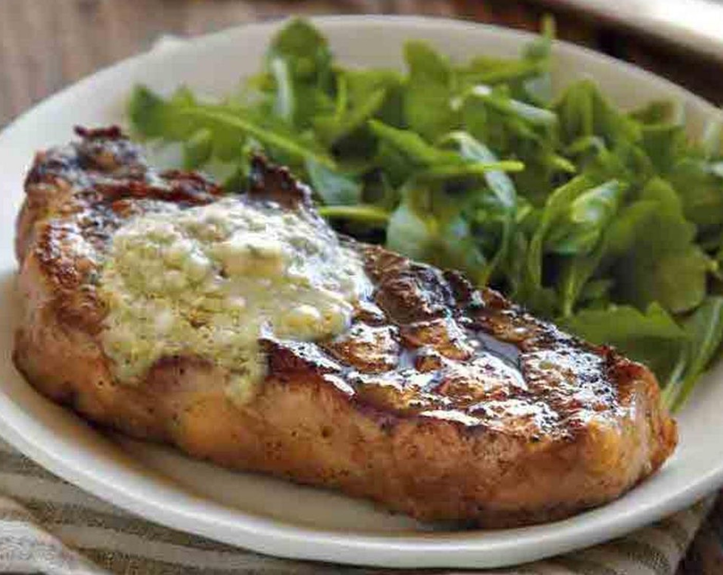 step 5 Remove the pan from the oven and let the steaks rest for 5 minutes. Serve with a pat of butter on each steak and enjoy!