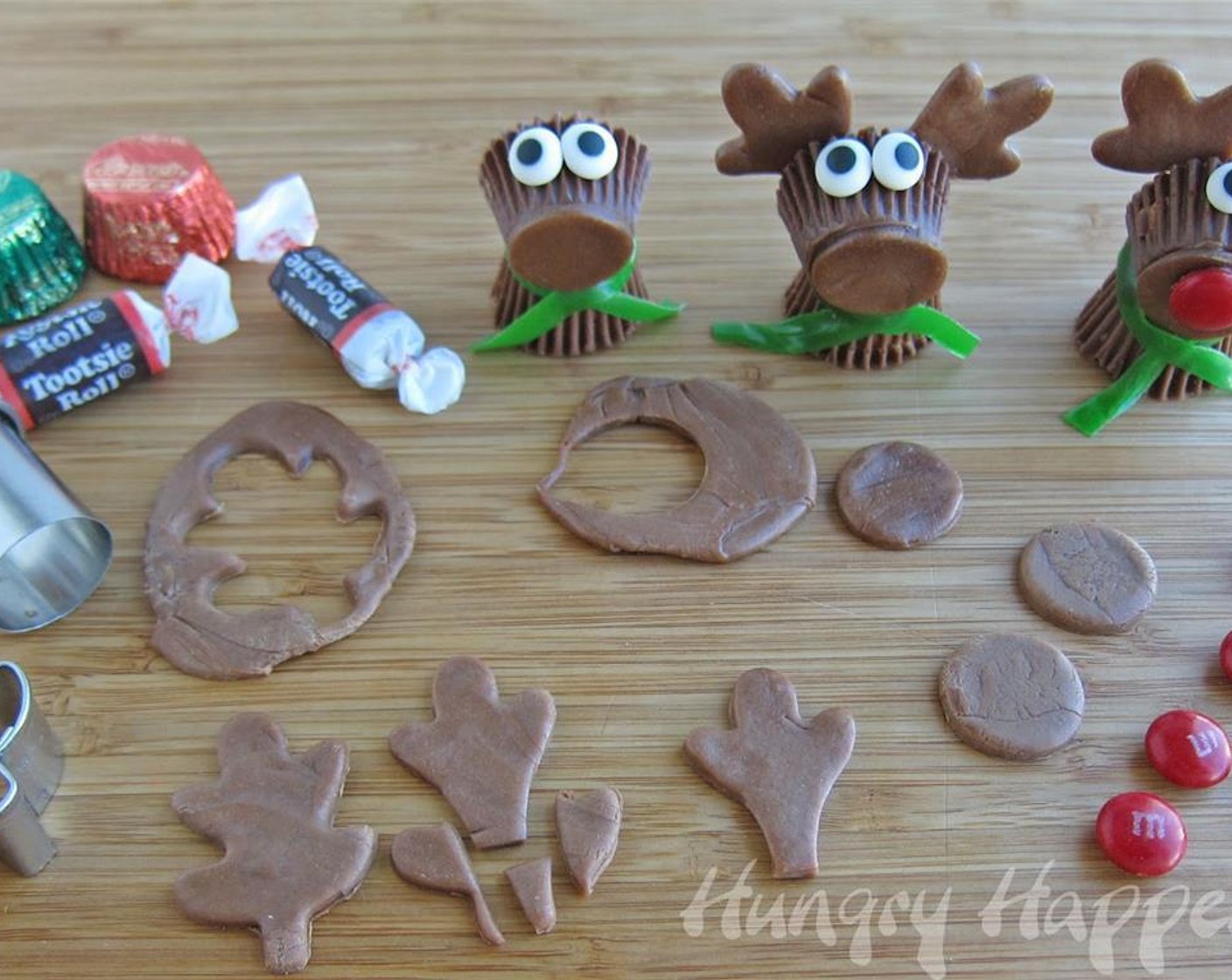 step 6 Cut a circle out of a tootsie rolls using kitchen shears or a round cutter, making it the same size as the narrow end of a Reese's Cup