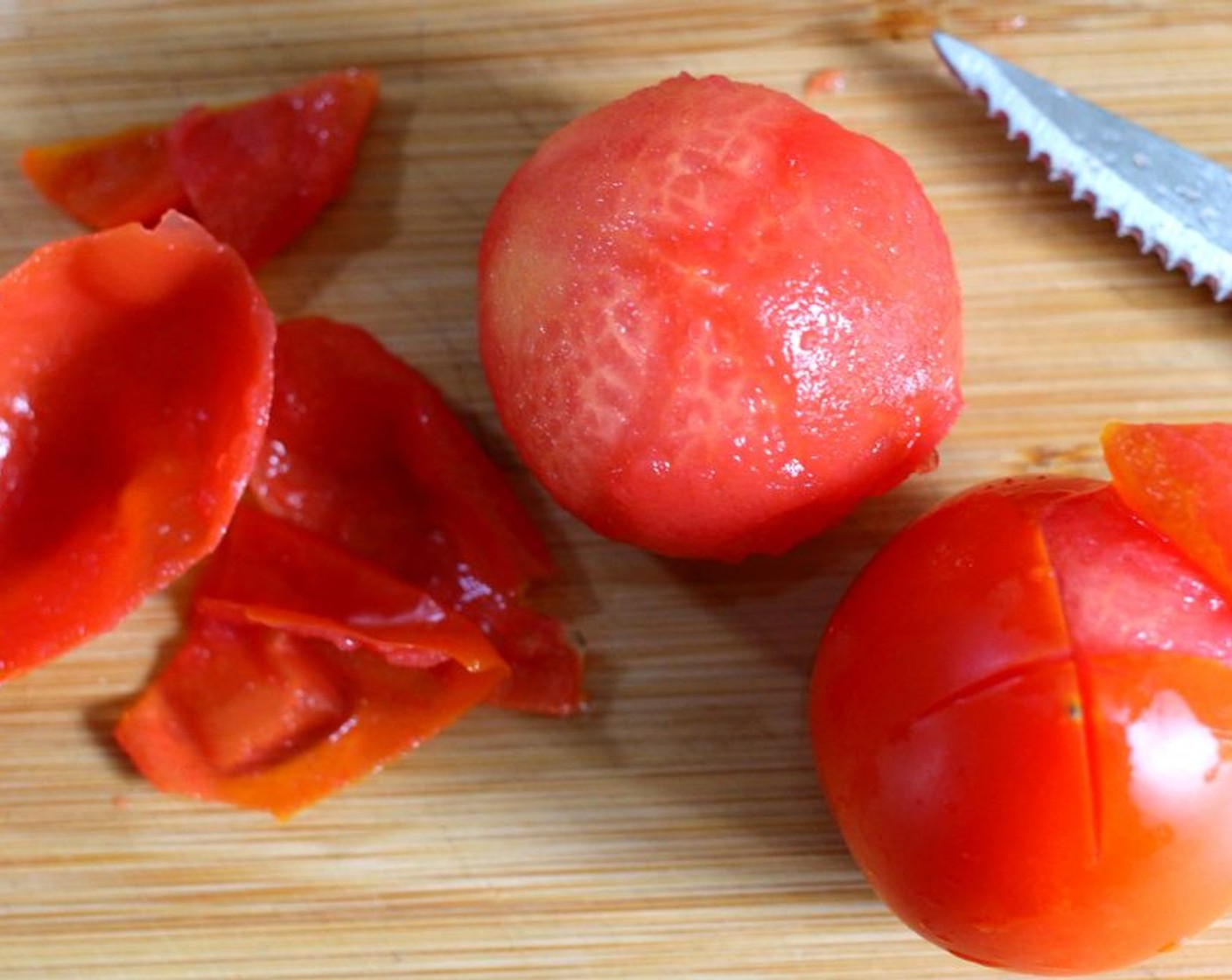 step 4 Peel the tomatoes and place them in a non-reactive container.