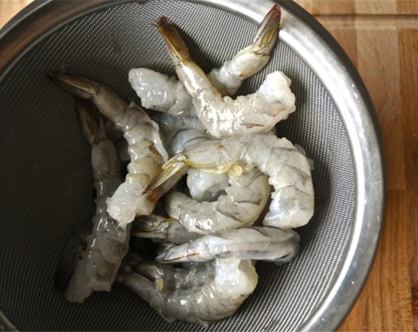 step 3 Peel and devein the Medium Shrimp (10). Rinse them and set aside in the refrigerator until you need them.
