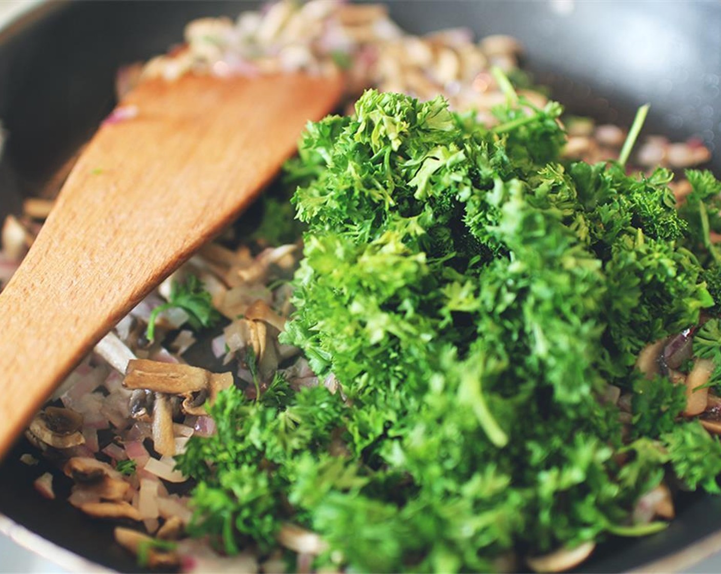 step 3 When the onions are brown, add in the bean mixture, Oats (1 handful) and Fresh Parsley (1 handful). Season with Salt (to taste) and Ground Black Pepper (to taste). Once everything is mixed well, remove from heat and cool.