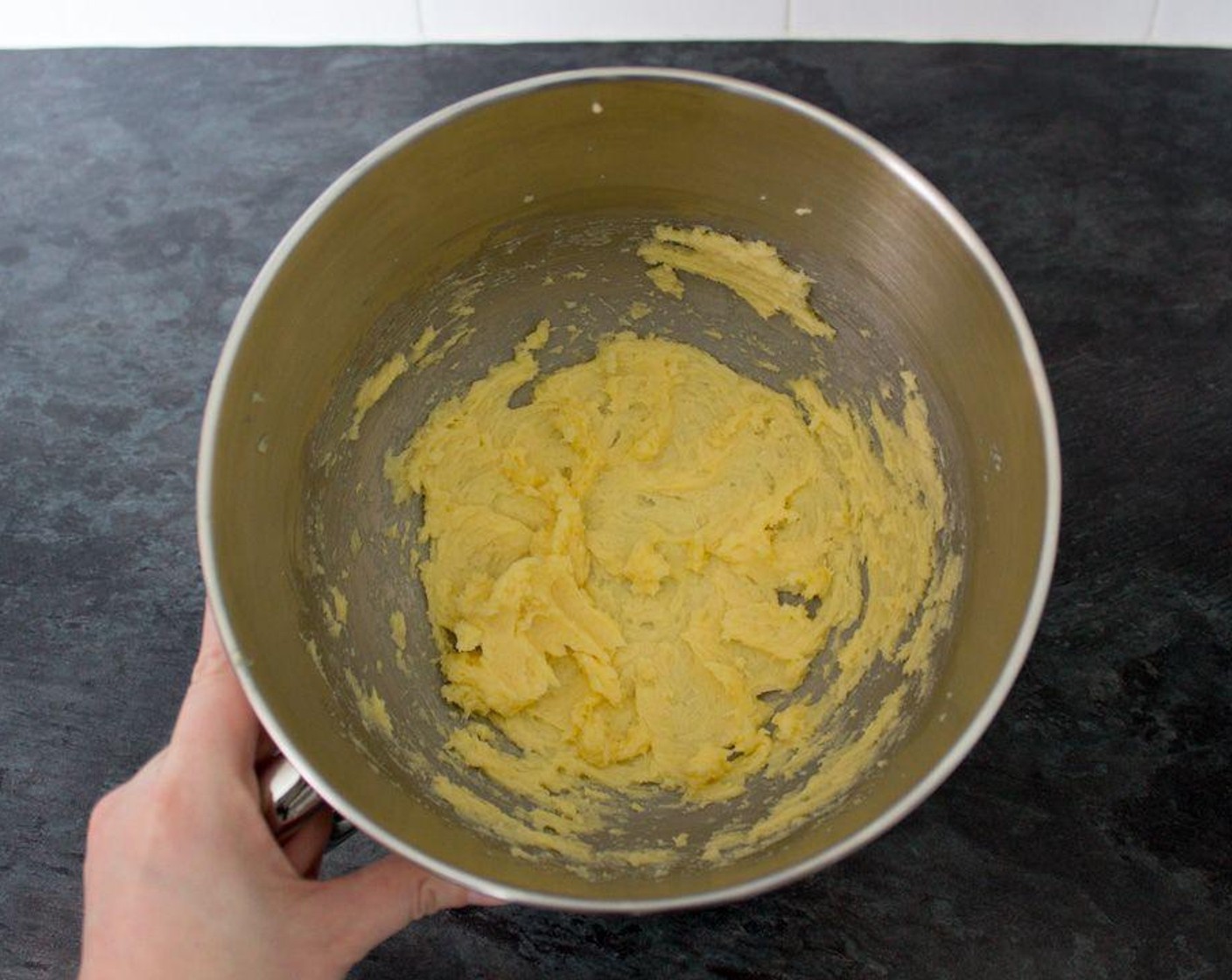 step 2 Either in a stand mixer or a large bowl using an electric hand whisk, cream together the Unsalted Butter (1/2 cup) and Golden Caster Sugar (3 1/2 Tbsp) until light and fluffy.