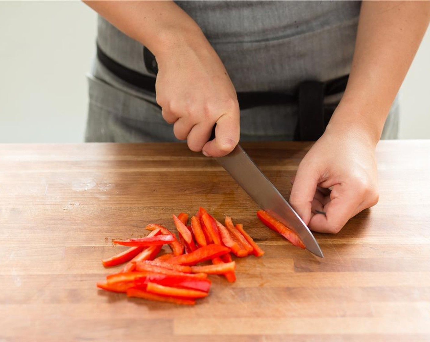 step 1 Remove the stem, pith, and seeds from the Red Bell Pepper (1) and discard. Cut pepper into quarter inch slices and set aside.