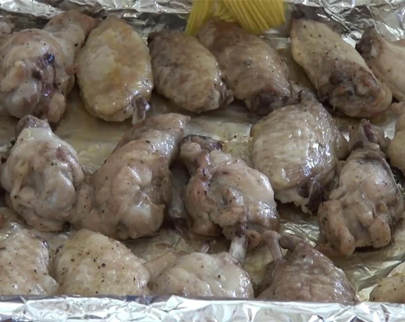 step 7 Remove the wings from the oven and glaze the wings with a thin layer of the honey mixture on both sides. Return to the oven and bake for another 15 minutes.