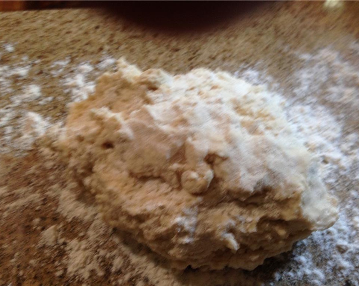 step 6 Turn dough onto a floured surface and dust the top with flour. Gently fold the dough over 5 to 6 times.