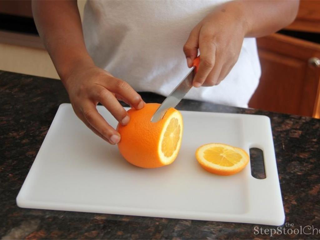 Step 1 of Orange Apple Cider Recipe: Start by cutting the Orange (1) into thin slices