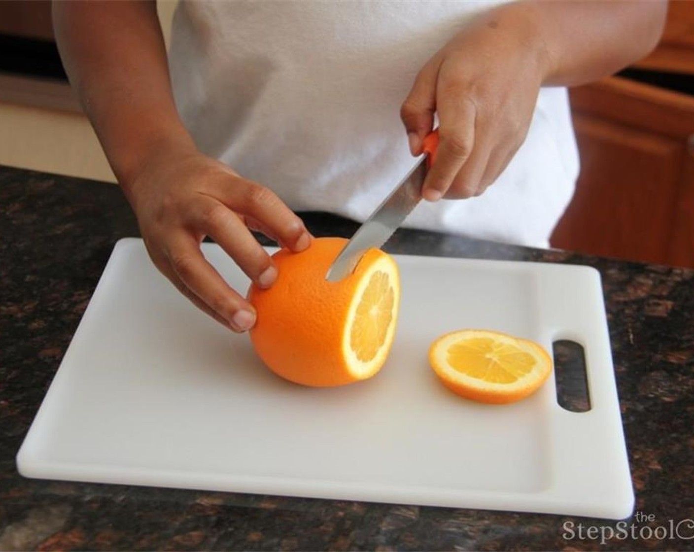 step 1 Start by cutting the Orange (1) into thin slices