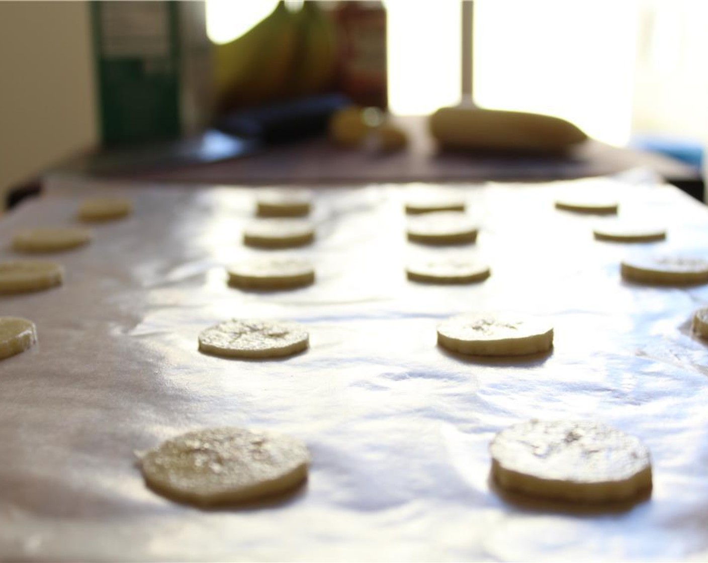 step 1 Place a sheet of wax paper on a baking tray. Slice the Banana (1) into thin layers. Place banana onto wax paper in layers.